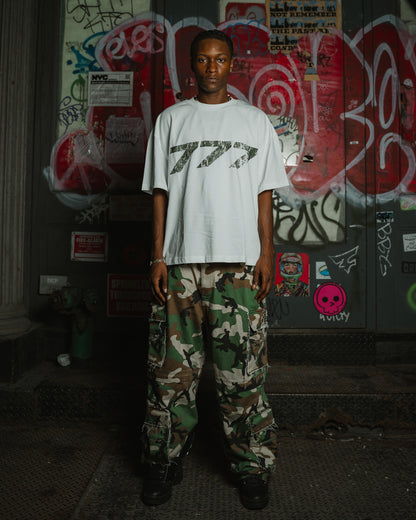 White tee green logo