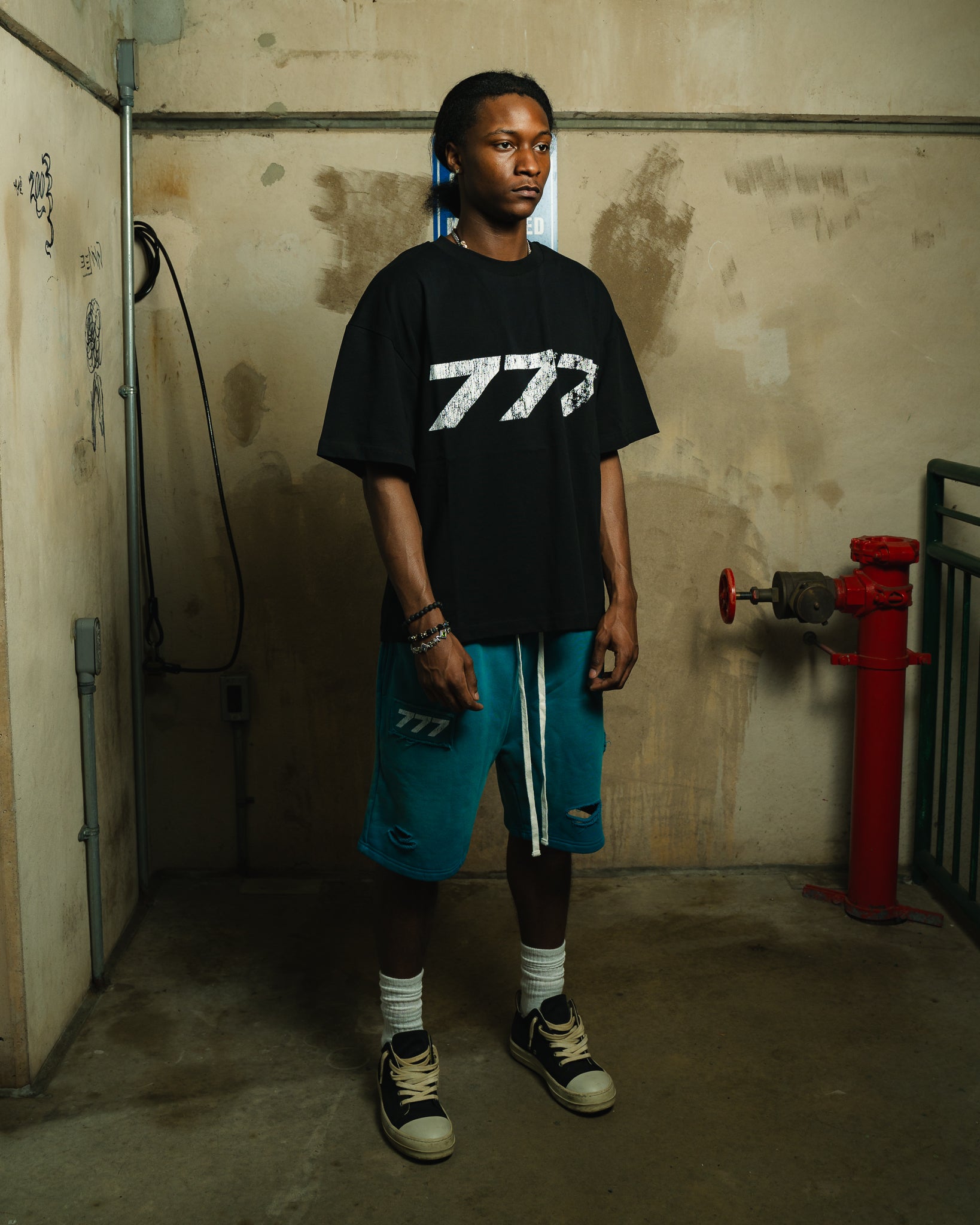 777 Black Tee